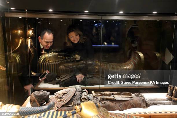 Countess Carnarvon with Egypt's Ambassador to the UK Ashaf El Kholy look at one of the exhibits in the Egyptian Exhibition in the cellars of...