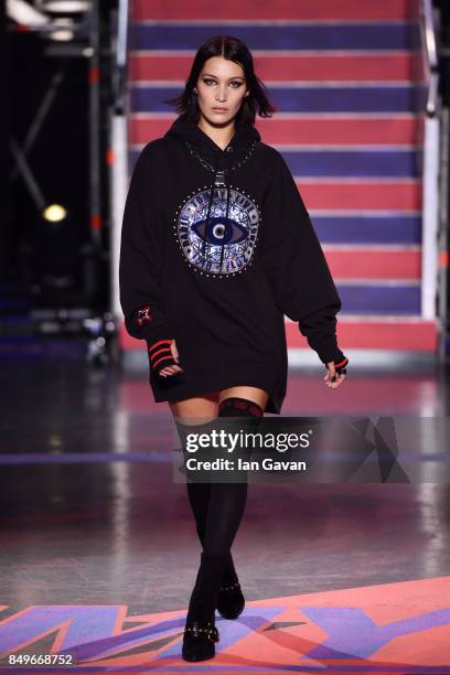 Bella Hadid walks the runway at the Tommy Hilfiger TOMMYNOW Fall 2017 Show during London Fashion Week September 2017 at the Roundhouse on September...