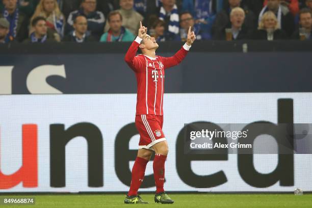 James Rodriguez of Bayern Muenchen celebrates after he scored his teams second goal to make it 2:0 during the Bundesliga match between FC Schalke 04...
