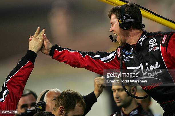 Jason Ratcliffe, crew chief for the Z-Line Designs Toyota driven by Kyle Busch, celebrates after Busch wins the NASCAR Nationwide Series Stater Bros....