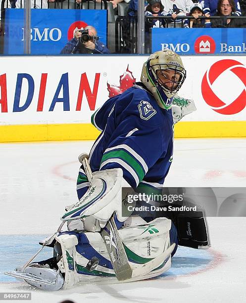 Roberto Luongo of the Vancouver Canucks makes a save against the Toronto Maple Leafs during their NHL game at the Air Canada Centre February 21, 2009...