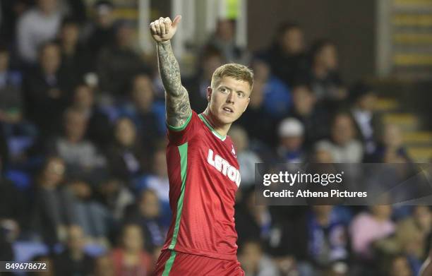 Alfie Mawson of Swansea City celebrates scoring his sides first goal of the match during the Carabao Cup Third Round match between Reading and...