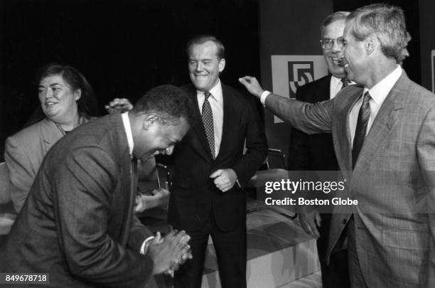 From left, Diane Moriarty, Bruce Bolling, James Brett, Tom Menino and Bob Rufo enjoy a light moment after a terse debate at WCVB in Needham, Mass.,...