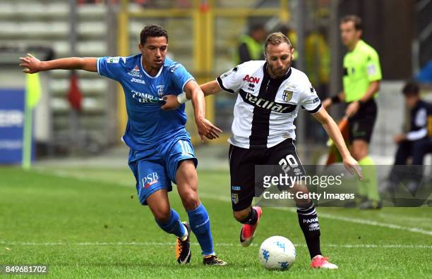 Antonio Di Gaudio of Parma Calcio competes for the ball whit Ismael Bennacer of Empoli fc during the Serie B match between Parma Calcio and Empoli FC...