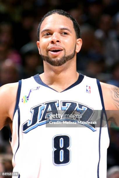 Deron Williams of the Utah Jazz is wearing the commemorative patch for the death of Larry H. Miller owner of the Utah Jazz during the game against...