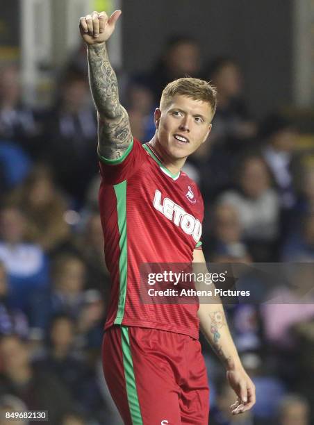 Alfie Mawson of Swansea City celebrates scoring his sides first goal of the match during the Carabao Cup Third Round match between Reading and...