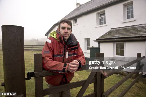 Head warden Matt Lipton beside the farmhouse on Flat Holm island in the Bristol Channel. Flat Holm is a limestone island in the Bristol Channel...