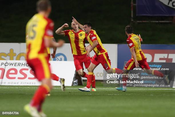 Kris Doolan of Partick Thistle celebrates after he scores during the Betfred League Cup Quarter Final at Firhill Stadium on September 19, 2017 in...