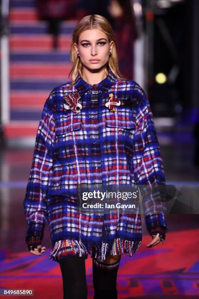 Hailey Baldwin walks the runway at the Tommy Hilfiger TOMMYNOW Fall 2017 Show during London Fashion Week September 2017 at the Roundhouse on...