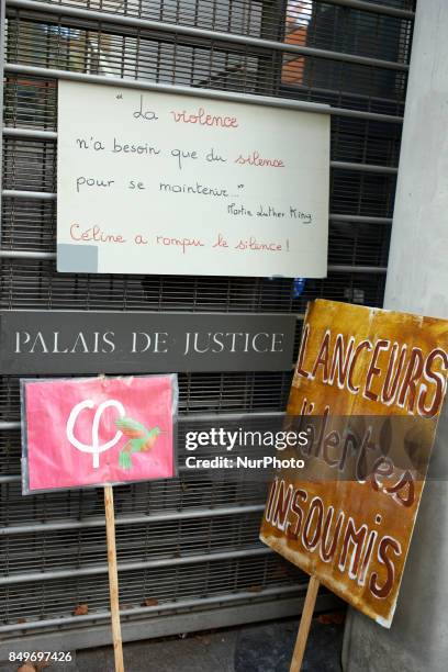 Placards in front of the Toulouse Law Court in support of Celine Boussie, French whistleblower and president of the association...