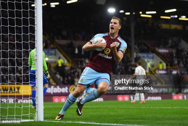 Chris Wood of Burnley celebrates after scoring a penalty during the Carabao Cup Third Round match between Burnley and Leeds United at Turf Moor on...