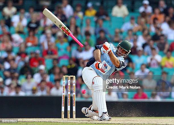 Matthew Hayden of Waugh's XI loses his bat during the Australia's Big Bash Twenty20 Victorian Bushfire Appeal charity match at the Sydney Cricket...