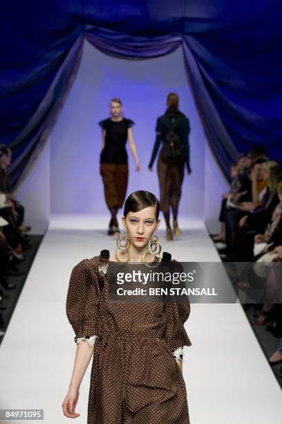 Model walks down the catwalk wearing clothes by designer Betty Jackson, part of the Autumn/Winter 2009 collection, on the third day of London Fashion...