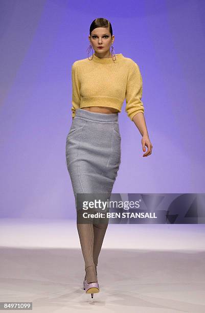 Model walks down the catwalk wearing clothes by designer Betty Jackson, part of the Autumn/Winter 2009 collection, on the third day of London Fashion...