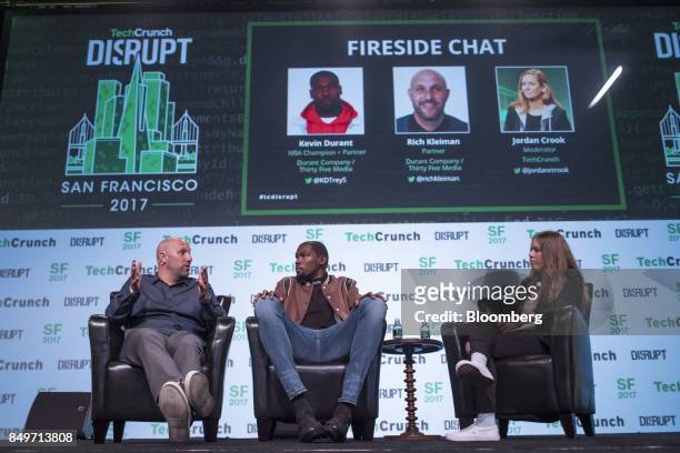Rich Kleiman, partner of Durant Co. And Thirty Five Media, left, speaks as Kevin Durant, a professional basketball player with the National...