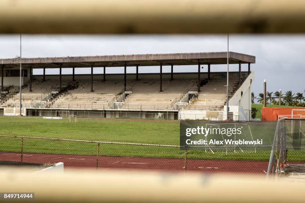 An empty soccer stadium stands along Avenida Munoz Rivera as residents prepare for a direct hit from Hurricane Maria on September 19, 2017 in San...