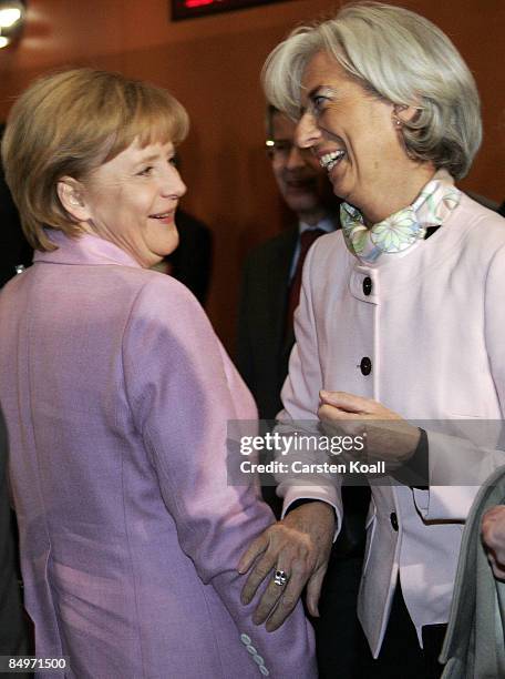 German Chancellor Angela Merkel greats Christine Lagarde , French Minister of Economics and Finance, upon their arrival for a meeting of European...