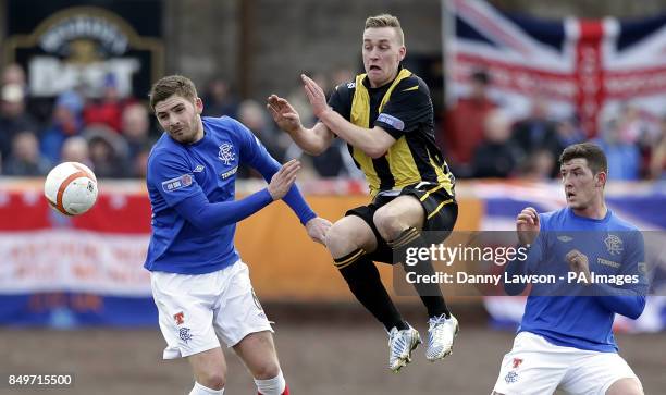 Rangers' Kyle Hutton and Berwick's Darren Lavery fight for the ball during the IRN-BRU Scottish Third Division match at Shielfield Park, Berwick.