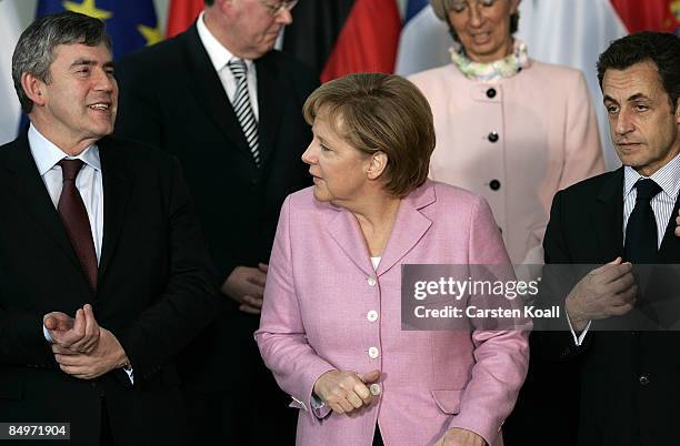 : British Prime Minister Gordon Brown,German Chancellor Angela Merkel and French President Nicolas Sarkozy, come together for a family photo after a...