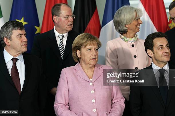 : British Prime Minister Gordon Brown,German Chancellor Angela Merkel and French President Nicolas Sarkozy, come together for a family photo after a...