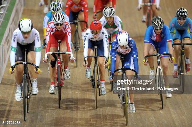 Great Britain's Laura Trott in the omnium scratch race, behind her main rival, the USA's Sarah Hammer on day five of the UCI Track Cycling World...