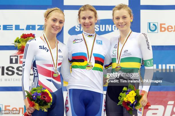 Great Britain's Laura Trott celebrates Silver in the omnium, with Gold medalist the USA's Sarah Hammer and Bronze medalist Australia's Annette...