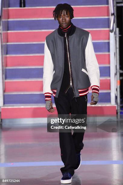 Model walks the runway at the TOMMYNOW by Tommy Hilfiger Fall Winter 2017 fashion show during London Fashion Week on September 19, 2017 in London,...