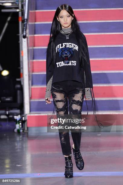 Model walks the runway at the TOMMYNOW by Tommy Hilfiger Fall Winter 2017 fashion show during London Fashion Week on September 19, 2017 in London,...