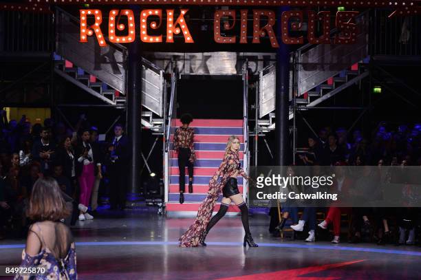 Supermodel Gigi Hadid walks the runway at the TOMMYNOW by Tommy Hilfiger Fall Winter 2017 fashion show during London Fashion Week on September 19,...