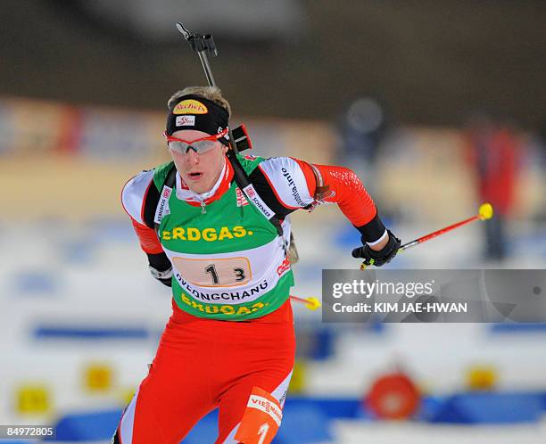 Dominik Landertinger of Austria skis during the men's relay race at the IBU World Biathlon Championships in Pyeongchang, east of Seoul on February...