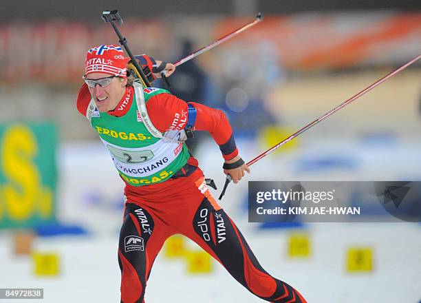 Lars Berger of Norway skis during the men's relay race at the IBU World Biathlon Championships in Pyeongchang, east of Seoul on February 22, 2009....