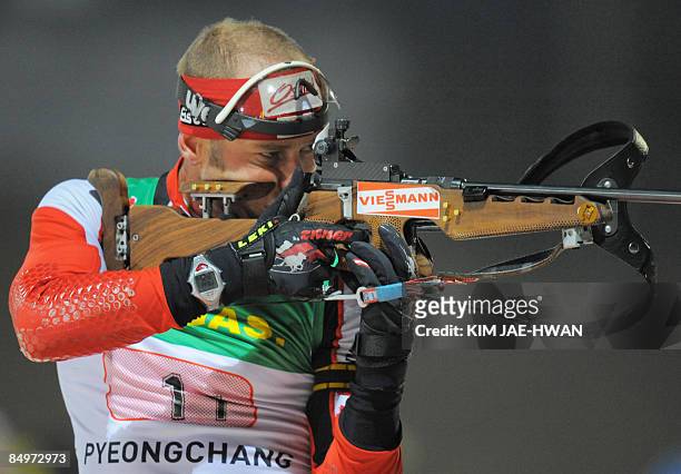 Daniel Mesotitsch of Austria shoots during the men's relay race at the IBU World Biathlon Championships in Pyeongchang, east of Seoul on February 22,...