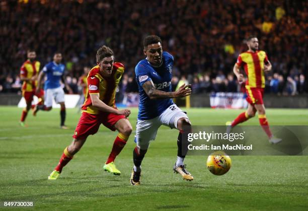 Kevin Nisbet of Partick Thistle vies with James Tavernier of Rangers during the Betfred League Cup Quarter Final at Firhill Stadium on September 19,...