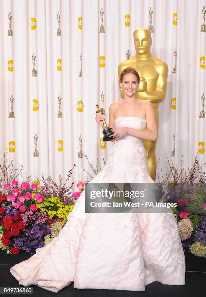 Jennifer Lawrence with her award for Best Actress received for her role in Silver Linings Playbook at the 85th Academy Awards at the Dolby Theatre,...