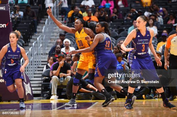 Nneka Ogwumike of the Los Angeles Sparks plays defense against Camille Little of the Phoenix Mercury in Game One of the Semifinals during the 2017...