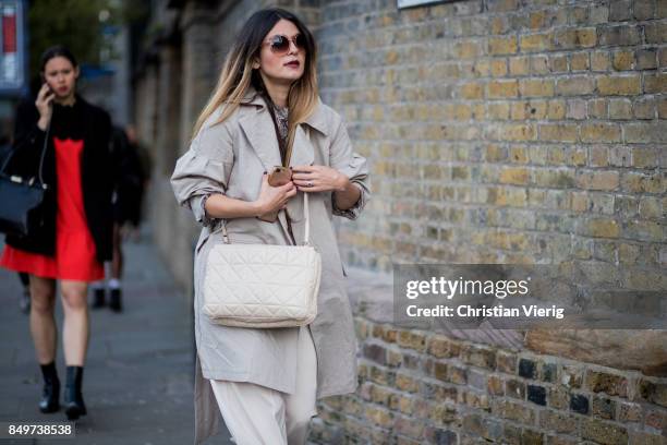 Guest outside Tommy Hilfiger during London Fashion Week September 2017 on September 19, 2017 in London, England.