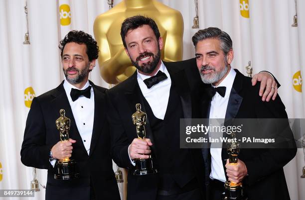 George Clooney, Grant Heslov and Ben Affleck with their oscars for best picture received for Argo at the 85th Academy Awards at the Dolby Theatre,...