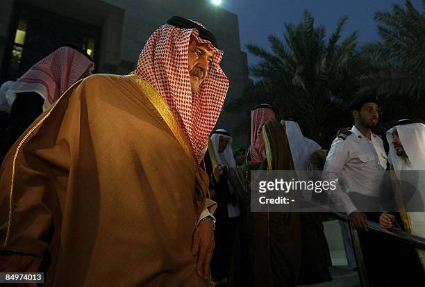 Saudi Foreign Minister Saud al-Faisal leaves following a meeting with counterparts and finance ministers of the six Gulf Cooperation Council...