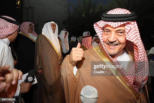 Saudi Foreign Minister Saud al-Faisal speaks to a journalist as he leaves following a meeting with counterparts and finance ministers of the six Gulf...