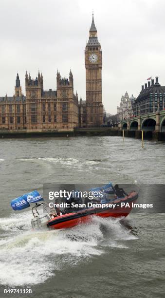 Frogmen on a boat by Westminster Bridge in central London as the Marine Conservation Society joins forces with BSAC to call for a commitment by...