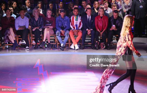 Caroline Issa, Shawn Yue, Poppy Delevingne, Lara Stone, Neymar, Lewis Hamilton, Frank Cancelloni, Yolanda Hadid and Luiz Mattos watch Gigi Hadid walk...