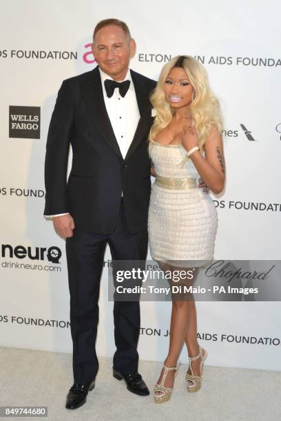 Nicki Minaj and guest arriving for 2013 Elton John AIDS Foundation Oscar Party held at West Hollywood Park in West Hollywood, Los Angeles.