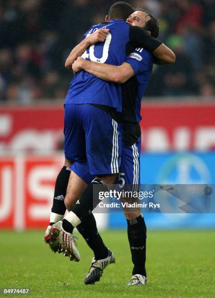 Joris Mathijsen and Dennis Aogo of Hamburg celebrate after winning 1:2 the Bundesliga match between Bayer Leverkusen and Hamburger SV at the LTU...
