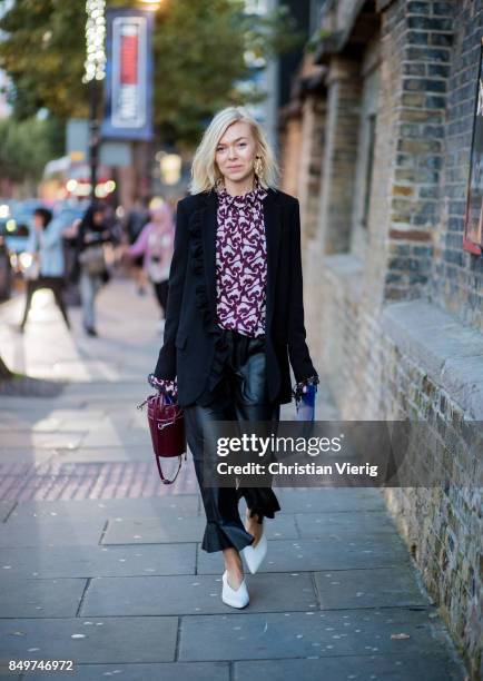 Guest outside Tommy Hilfiger during London Fashion Week September 2017 on September 19, 2017 in London, England.