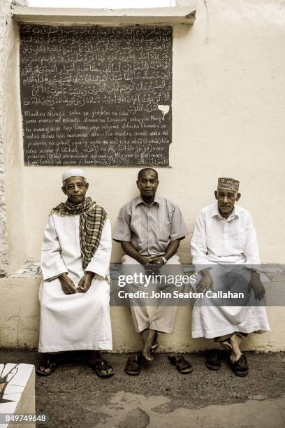 muslim men on anjouan island - mutsamudu stock-fotos und bilder