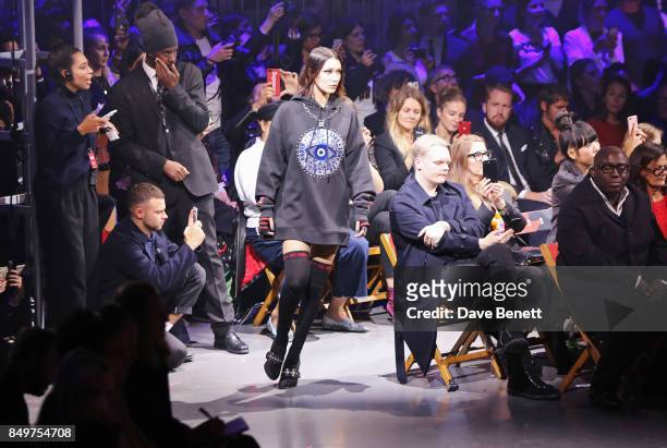 Bella Hadid walks the runway at the Tommy Hilfiger TOMMYNOW Fall 2017 Show during London Fashion Week September 2017 at The Roundhouse on September...