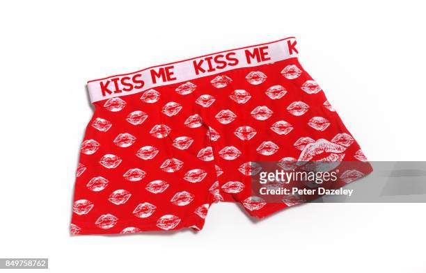 kiss me quick pants boxer shorts - red shorts stock pictures, royalty-free photos & images