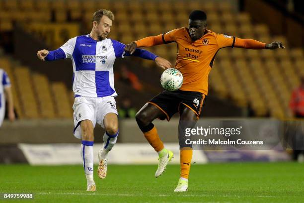 Alfred N'Diaye of Wolverhampton Wanderers competes with Chris Lines of Bristol Rovers during the Carabao Cup tie between Wolverhampton Wanderers and...