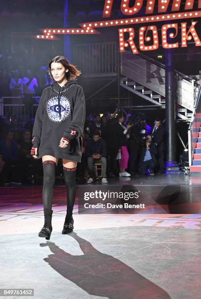 Bella Hadid walks the runway at the Tommy Hilfiger TOMMYNOW Fall 2017 Show during London Fashion Week September 2017 at The Roundhouse on September...