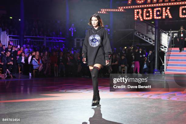 Bella Hadid walks the runway at the Tommy Hilfiger TOMMYNOW Fall 2017 Show during London Fashion Week September 2017 at The Roundhouse on September...